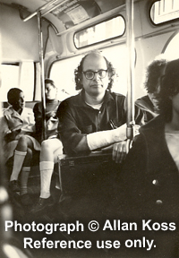 Allen Ginsberg calmly riding on a bus, 1970 